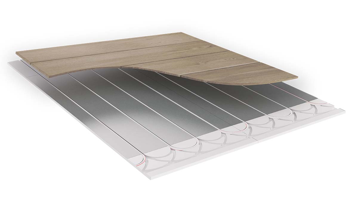 Suelo radiante seco: panel con lámina difusora de aluminio, tubos y pavimento de madera encima